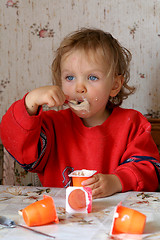 Image showing Eating yogurt