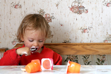 Image showing Eating yogurt