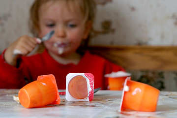 Image showing Eating yogurt