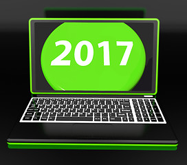 Image showing Two Thousand And Seventeen On Laptop Shows New Year Resolution 2