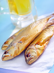 Image showing smoked fish with beer