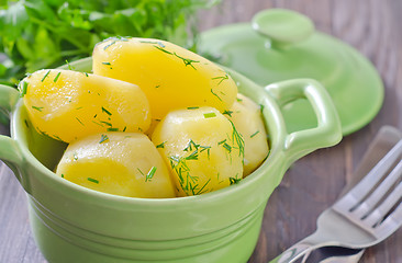 Image showing boiled potato in green bowl