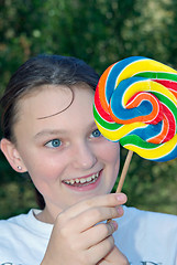 Image showing teenager with lollipop