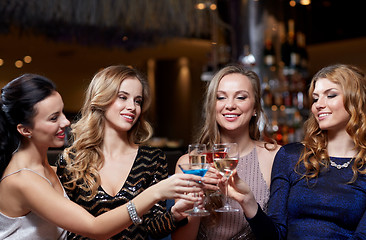 Image showing happy women with drinks at night club