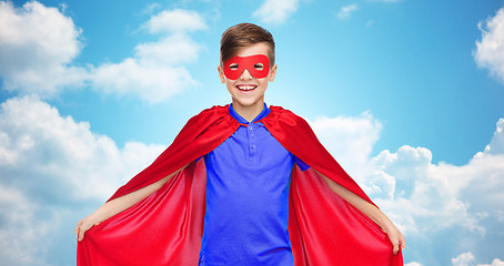 Image showing boy in red super hero cape and mask