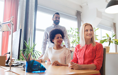 Image showing happy creative team in office