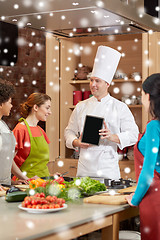 Image showing happy women with chef and tablet pc in kitchen