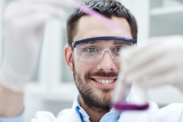 Image showing young scientist making test or research in lab