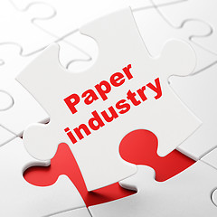 Image showing Manufacuring concept: Paper Industry on puzzle background