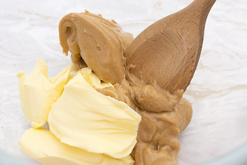 Image showing Mixing pats of butter and peanut butter 