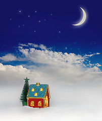 Image showing Christmas festive light in house under blue sky