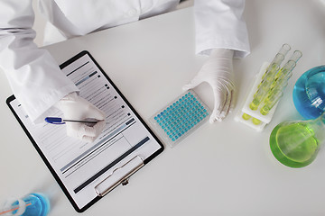 Image showing close up of scientist making test in lab