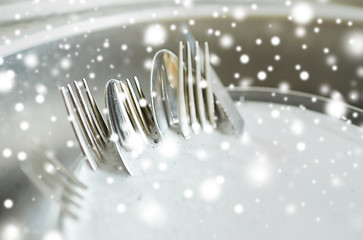 Image showing close up of dirty dishes washing in kitchen sink