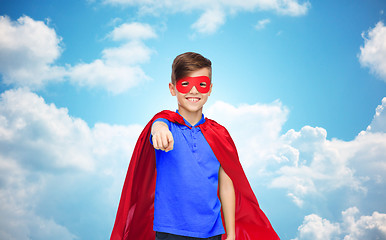 Image showing happy boy in red superhero cape and mask