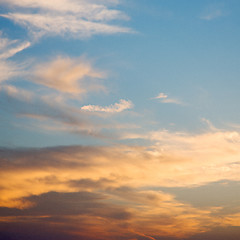 Image showing in the red blue sky cloud and sunrise orange color