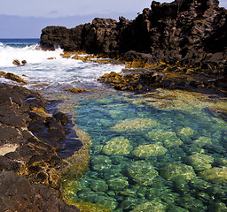 Image showing cloudy  beach    water   lanzarote  isle   rock spain   stone sk