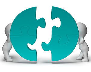 Image showing Jigsaw Pieces Being Joined Showing Teamwork And Togetherness