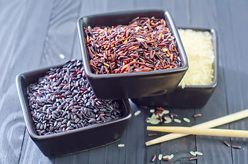 Image showing raw rice in bowls