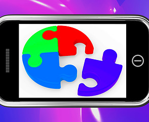 Image showing Unfinished Puzzle On Smartphone Showing Teamwork