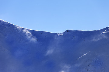 Image showing Winter mountain ridge at wind early morning