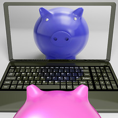 Image showing Piggy On Screen Shows Internet Investment Savings