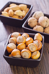 Image showing nuts in the black bowls