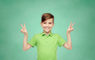 Image showing school boy showing peace or victory hand sign