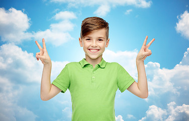 Image showing happy boy showing peace or victory hand sign