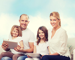 Image showing happy family with tablet pc computers