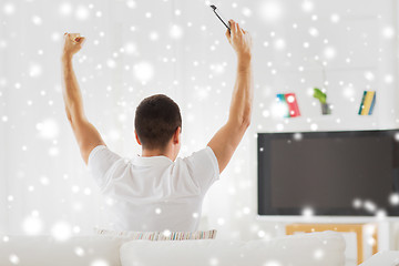 Image showing man watching tv and supporting team at home