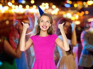 Image showing happy young woman or teen girl in party hat