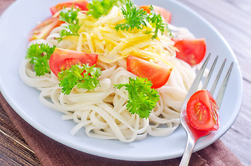 Image showing pasta with cheese and tomato