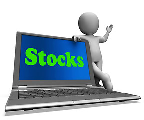 Image showing Stocks Laptop Shows Shares Dow And Stock Market