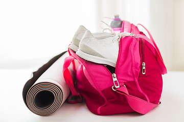 Image showing close up of female sports stuff in bag