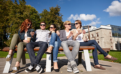 Image showing group of students or teenagers drinking coffee