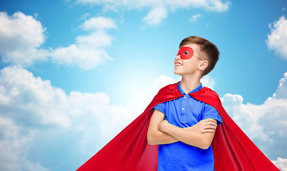 Image showing boy in red super hero cape and mask