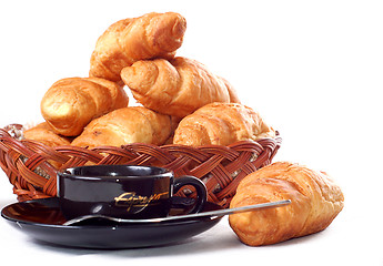 Image showing cup of coffee with fresh croissants