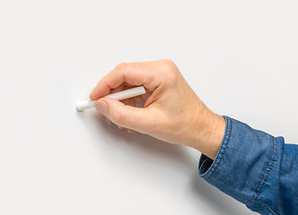 Image showing hand with white crayon