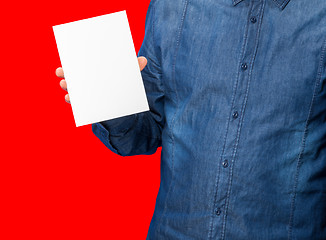 Image showing man holding a sign