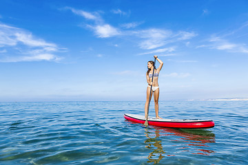 Image showing Woman practicing paddle