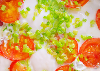 Image showing fried eggs with fresh tomato