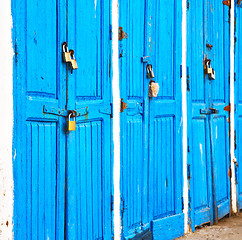 Image showing in africa morocco  old harbor wood   door and the blue sky