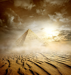 Image showing Storm clouds and pyramids