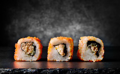 Image showing Tasty rolls on black