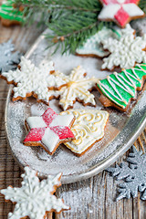 Image showing Christmas cookies sprinkled with powdered sugar.