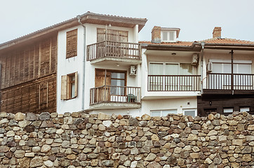 Image showing Houses Behind a Wall