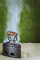 Image showing Steaming Hot Iron