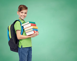 Image showing happy student boy with school bag and books