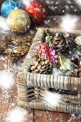 Image showing Wicker basket with Christmas toys