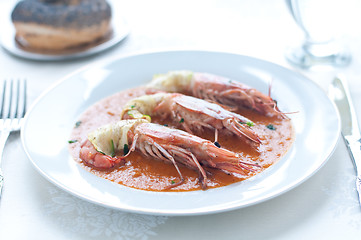 Image showing Prawns wrapped in zucchini with bisque sauce